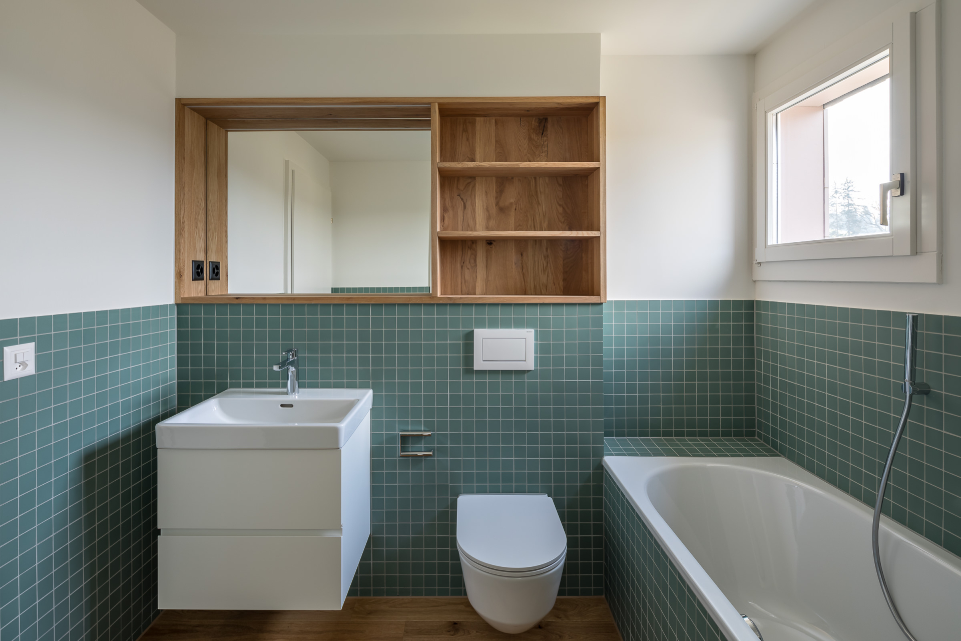 buan architekten – Umbau Attikawohnung Willisau – Foto – Bad gruen